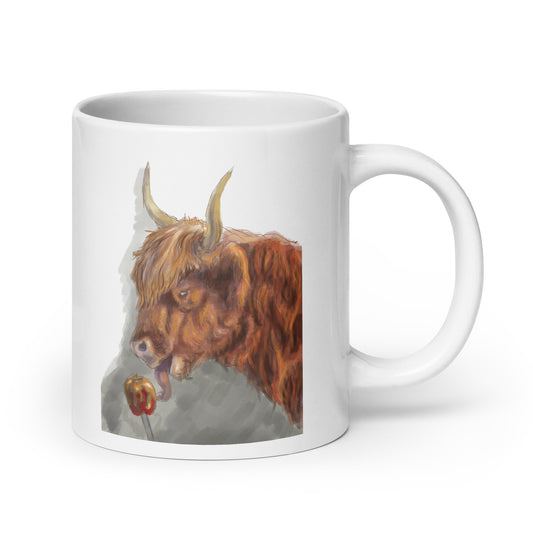 Highland cow eating Candied Apple White glossy mug